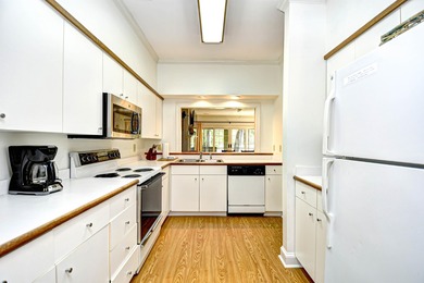 Beautifully Renovated Condo with Golf Course Views in Pawleys on Pawleys Plantation Golf and Country Club in South Carolina - for sale on GolfHomes.com, golf home, golf lot