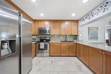 Under contract-accepting backup offers. GOLFLAND OF TAMPA'S on Babe Zaharias Golf Course in Florida - for sale on GolfHomes.com, golf home, golf lot