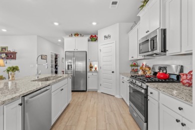 Built in 2022, this thoughtfully designed 3-bedroom, 2-bathroom on River Oaks Golf Plantation  in South Carolina - for sale on GolfHomes.com, golf home, golf lot