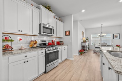 Built in 2022, this thoughtfully designed 3-bedroom, 2-bathroom on River Oaks Golf Plantation  in South Carolina - for sale on GolfHomes.com, golf home, golf lot