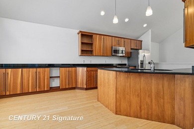 Welcome to this stunning, move in ready home that overlooks the on Swan Valley Golf Club in Michigan - for sale on GolfHomes.com, golf home, golf lot