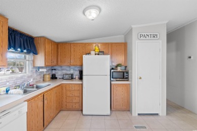 Tucked away in a desirable area of Little River, this 3-bedroom on Eagle Nest Golf Club in South Carolina - for sale on GolfHomes.com, golf home, golf lot
