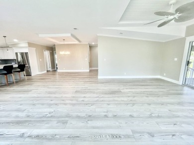 Welcome to Luxury living in the heart of the prestigious 55+ on Crane Lakes Golf and Country Club in Florida - for sale on GolfHomes.com, golf home, golf lot