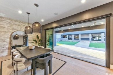 This home is a singular masterpiece, offering an unmatched on Montreux Golf and Country Club in Nevada - for sale on GolfHomes.com, golf home, golf lot
