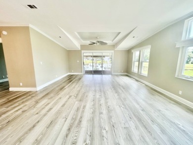 Welcome to Luxury living in the heart of the prestigious 55+ on Crane Lakes Golf and Country Club in Florida - for sale on GolfHomes.com, golf home, golf lot