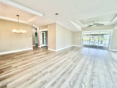 Welcome to Luxury living in the heart of the prestigious 55+ on Crane Lakes Golf and Country Club in Florida - for sale on GolfHomes.com, golf home, golf lot