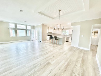 Welcome to Luxury living in the heart of the prestigious 55+ on Crane Lakes Golf and Country Club in Florida - for sale on GolfHomes.com, golf home, golf lot
