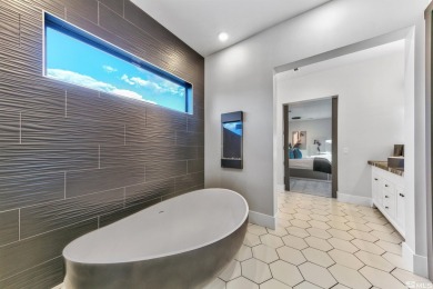 This home is a singular masterpiece, offering an unmatched on Montreux Golf and Country Club in Nevada - for sale on GolfHomes.com, golf home, golf lot