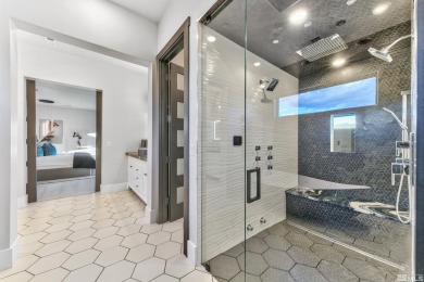 This home is a singular masterpiece, offering an unmatched on Montreux Golf and Country Club in Nevada - for sale on GolfHomes.com, golf home, golf lot