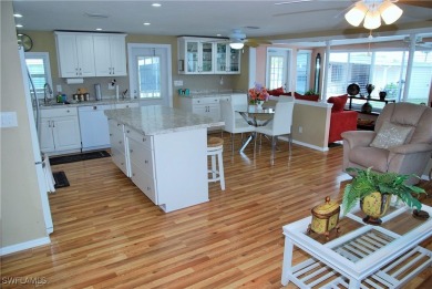 Updated and move-in ready, this residence is nestled in the on Six Lakes Country Club in Florida - for sale on GolfHomes.com, golf home, golf lot