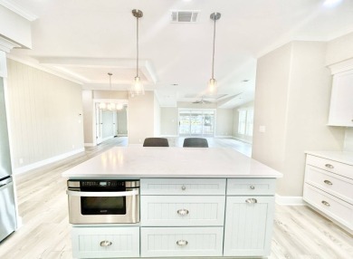 Welcome to Luxury living in the heart of the prestigious 55+ on Crane Lakes Golf and Country Club in Florida - for sale on GolfHomes.com, golf home, golf lot