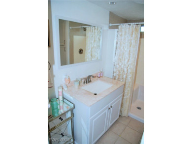 Updated and move-in ready, this residence is nestled in the on Six Lakes Country Club in Florida - for sale on GolfHomes.com, golf home, golf lot