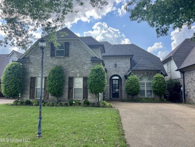 Nestled within the serene and sought-after golf course community on Cherokee Valley Golf Course in Mississippi - for sale on GolfHomes.com, golf home, golf lot
