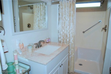 Updated and move-in ready, this residence is nestled in the on Six Lakes Country Club in Florida - for sale on GolfHomes.com, golf home, golf lot