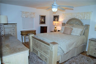 Updated and move-in ready, this residence is nestled in the on Six Lakes Country Club in Florida - for sale on GolfHomes.com, golf home, golf lot