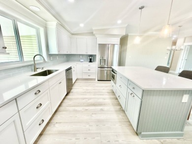 Welcome to Luxury living in the heart of the prestigious 55+ on Crane Lakes Golf and Country Club in Florida - for sale on GolfHomes.com, golf home, golf lot