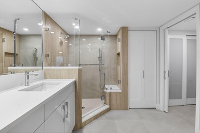 Meticulously upgraded, vibrant first floor 2 bedroom 2 bath on Gleneagles Golf and Country Club in Florida - for sale on GolfHomes.com, golf home, golf lot