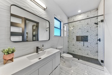 This home is a singular masterpiece, offering an unmatched on Montreux Golf and Country Club in Nevada - for sale on GolfHomes.com, golf home, golf lot