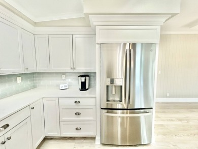 Welcome to Luxury living in the heart of the prestigious 55+ on Crane Lakes Golf and Country Club in Florida - for sale on GolfHomes.com, golf home, golf lot
