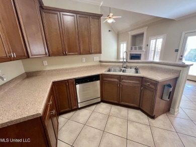 Nestled within the serene and sought-after golf course community on Cherokee Valley Golf Course in Mississippi - for sale on GolfHomes.com, golf home, golf lot