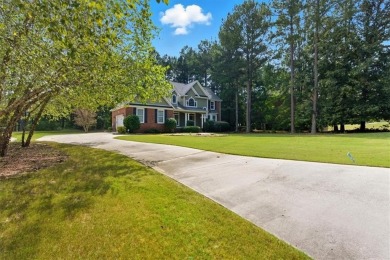 Beautiful home located on Stonebridge Golf Course! As you enter on Stonebridge Golf Club in Georgia - for sale on GolfHomes.com, golf home, golf lot