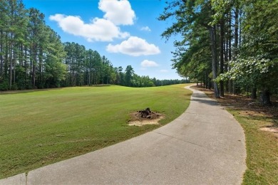 Beautiful home located on Stonebridge Golf Course! As you enter on Stonebridge Golf Club in Georgia - for sale on GolfHomes.com, golf home, golf lot