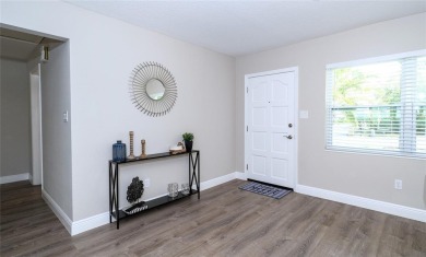 A Rare Find! Welcome to this FULLY UPDATED 3 bedroom, 2 bath on Temple Terrace Golf and Country Club in Florida - for sale on GolfHomes.com, golf home, golf lot