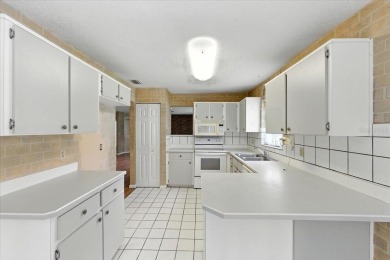 Unbeatable value in Pine Lakes Golf Community! Tucked away at on The Grand Club - Pine Lakes Course in Florida - for sale on GolfHomes.com, golf home, golf lot