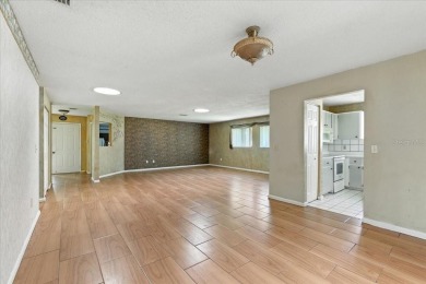 Unbeatable value in Pine Lakes Golf Community! Tucked away at on The Grand Club - Pine Lakes Course in Florida - for sale on GolfHomes.com, golf home, golf lot