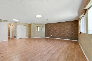 Unbeatable value in Pine Lakes Golf Community! Tucked away at on The Grand Club - Pine Lakes Course in Florida - for sale on GolfHomes.com, golf home, golf lot