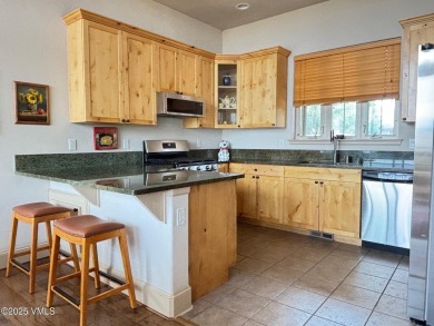 Panoramic views from this air-conditioned 4 bedroom, 3  1/2 on Gypsum Creek Golf Course in Colorado - for sale on GolfHomes.com, golf home, golf lot