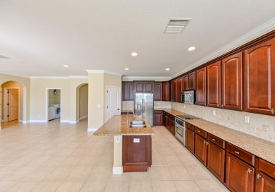 This spacious 4 bedroom, 3.5 bathroom, 3 car garage, 2 story on Heritage Harbor Golf and Country Club in Florida - for sale on GolfHomes.com, golf home, golf lot