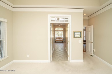 Welcome to 523 Candlewick Lane, a custombuilt ranch home on Ocean Ridge Plantation in North Carolina - for sale on GolfHomes.com, golf home, golf lot