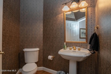 Welcome to 523 Candlewick Lane, a custombuilt ranch home on Ocean Ridge Plantation in North Carolina - for sale on GolfHomes.com, golf home, golf lot