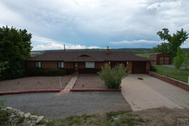 ATTENTION GOLFERS! This well built home sits just above the 12th on Hollydot Golf Course in Colorado - for sale on GolfHomes.com, golf home, golf lot