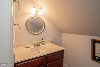 Welcome to 523 Candlewick Lane, a custombuilt ranch home on Ocean Ridge Plantation in North Carolina - for sale on GolfHomes.com, golf home, golf lot