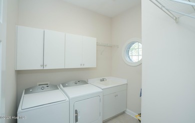 Welcome to 523 Candlewick Lane, a custombuilt ranch home on Ocean Ridge Plantation in North Carolina - for sale on GolfHomes.com, golf home, golf lot