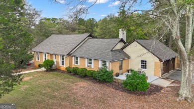 Priced below appraised value! Charming 4-sided brick home on Canongate Golf Club in Georgia - for sale on GolfHomes.com, golf home, golf lot