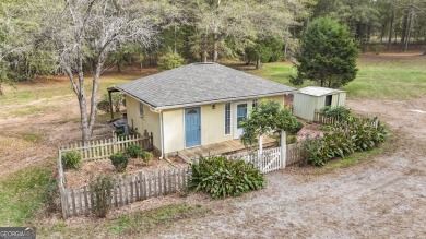 Priced below appraised value! Charming 4-sided brick home on Canongate Golf Club in Georgia - for sale on GolfHomes.com, golf home, golf lot