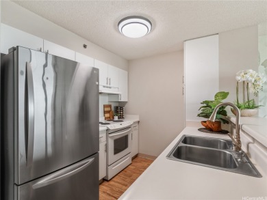Discover elevated island living at Country Club Village 6. This on Honolulu Country Club in Hawaii - for sale on GolfHomes.com, golf home, golf lot