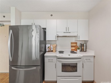 Discover elevated island living at Country Club Village 6. This on Honolulu Country Club in Hawaii - for sale on GolfHomes.com, golf home, golf lot
