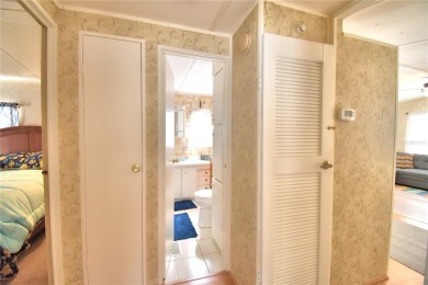 PRICE IMPROVEMENT...WELCOME TO YOUR FLORIDA RETIREMENT OASIS IN on Southern Dunes Golf and Country Club in Florida - for sale on GolfHomes.com, golf home, golf lot