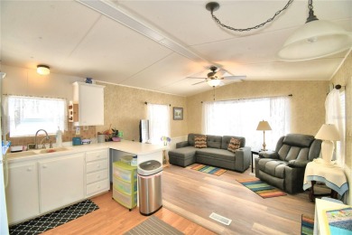 PRICE IMPROVEMENT...WELCOME TO YOUR FLORIDA RETIREMENT OASIS IN on Southern Dunes Golf and Country Club in Florida - for sale on GolfHomes.com, golf home, golf lot