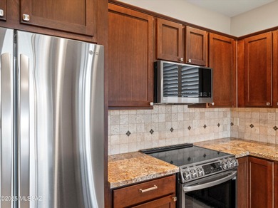 Enjoy sweeping panoramic vistas of the adjacent common area on Saddlebrooke Ranch Golf Club in Arizona - for sale on GolfHomes.com, golf home, golf lot