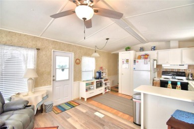 PRICE IMPROVEMENT...WELCOME TO YOUR FLORIDA RETIREMENT OASIS IN on Southern Dunes Golf and Country Club in Florida - for sale on GolfHomes.com, golf home, golf lot