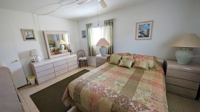 Rarely available ground floor end unit. Easy access to Sharkey's on Lake Venice Golf Club in Florida - for sale on GolfHomes.com, golf home, golf lot