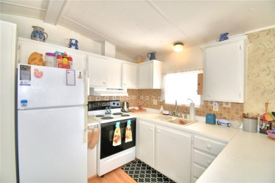 PRICE IMPROVEMENT...WELCOME TO YOUR FLORIDA RETIREMENT OASIS IN on Southern Dunes Golf and Country Club in Florida - for sale on GolfHomes.com, golf home, golf lot