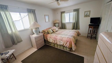Rarely available ground floor end unit. Easy access to Sharkey's on Lake Venice Golf Club in Florida - for sale on GolfHomes.com, golf home, golf lot
