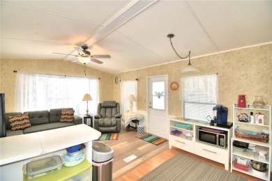 PRICE IMPROVEMENT...WELCOME TO YOUR FLORIDA RETIREMENT OASIS IN on Southern Dunes Golf and Country Club in Florida - for sale on GolfHomes.com, golf home, golf lot