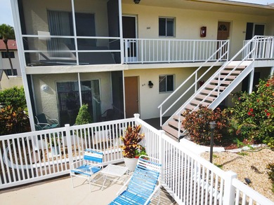 Rarely available ground floor end unit. Easy access to Sharkey's on Lake Venice Golf Club in Florida - for sale on GolfHomes.com, golf home, golf lot